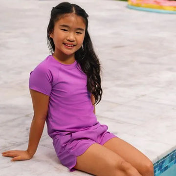 Girls Chlorine Resistant Short Sleeve Magic Print Swim Rash Guard